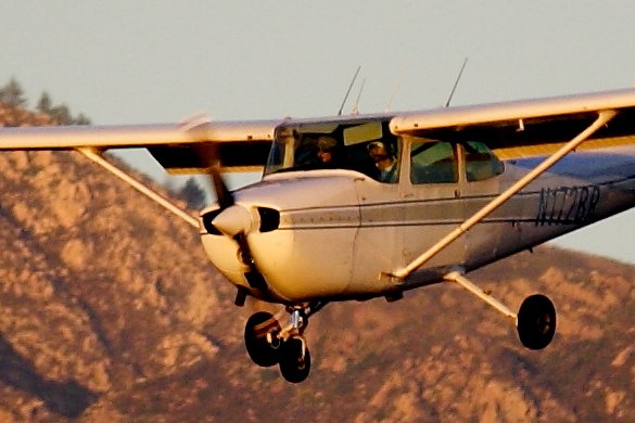 Cessna approaching KSBA Rwy 25 during sunset